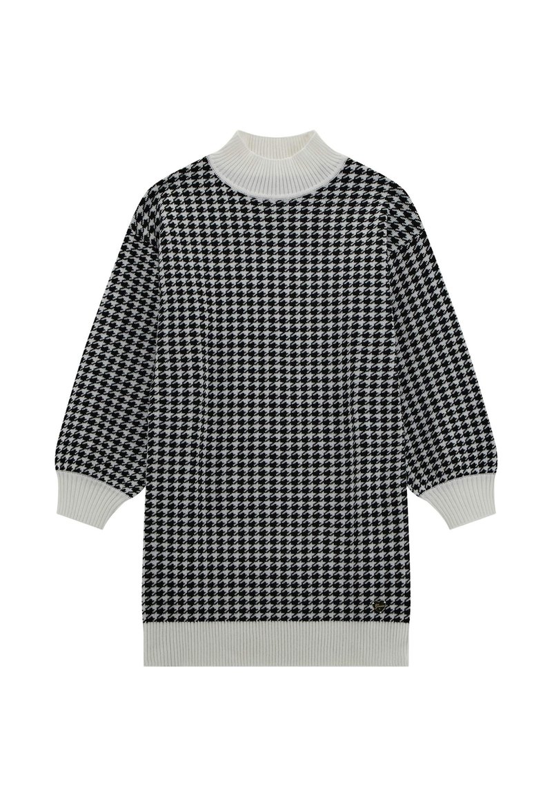 Juoda ir balta houndstooth rašto megztinis su aukštu ribotu apykakle ir plačiomis rankovėmis. Tekstūruota mezgimo medžiaga.