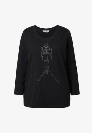 Czarna koszulka z długim rękawem z białym konturem przedstawiającym postać w garniturze i spódnicy oraz prostymi liniami poniżej, symbolizującymi ścieżkę.