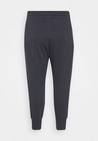 Under Armour Teplákové kalhoty - black