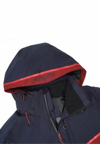 Giacca blu navale con cappuccio foderato in rosso, dotata di colletto alto, zip frontale, cordini regolabili e dettagli in rete.
