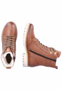 Brązowe skórzane botki za kostkę z beżowymi gumowymi podeszwami, z złotymi oczkami, zamkiem błyskawicznym z boku oraz miękką podszewką wewnętrzną.