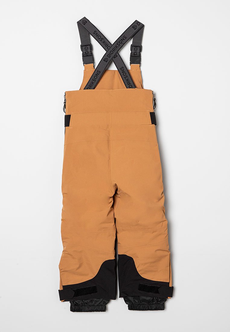 Oranga snöbyxor med svarta accenter. Har justerbara remmar, en slät yta och vad cuffs med Velcro-stängningar för perfekt passform.