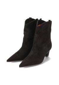 Black suede ankle boots with pointed toes, short stacked heels, and decorative stitching accents; sleek and structured design.