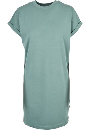 Jasnozielona sukienka t-shirt wykonana z miękkiej bawełny. Posiada okrągły dekolt, krótkie, podwinięte rękawy oraz prosty krój z bocznym rozcięciem dla wygody.