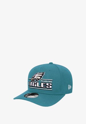 Teal baseball cap featuring an embroidered Philadelphia Eagles logo, with a flat brim and a structured crown. Includes a white stitched accent.