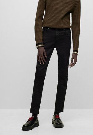 SKINNY FIT JEANS - Liibuvad teksad - black one