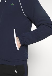 Lacoste Sport Bomber bunda - dark blue