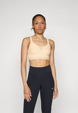triaction by Triumph ENERGY LITE - Medium support sports bra - passion orange