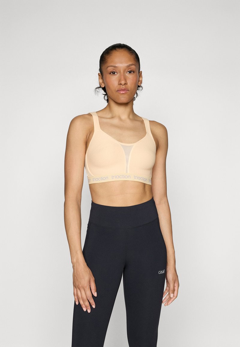 triaction by Triumph ENERGY LITE - Medium support sports bra - passion orange