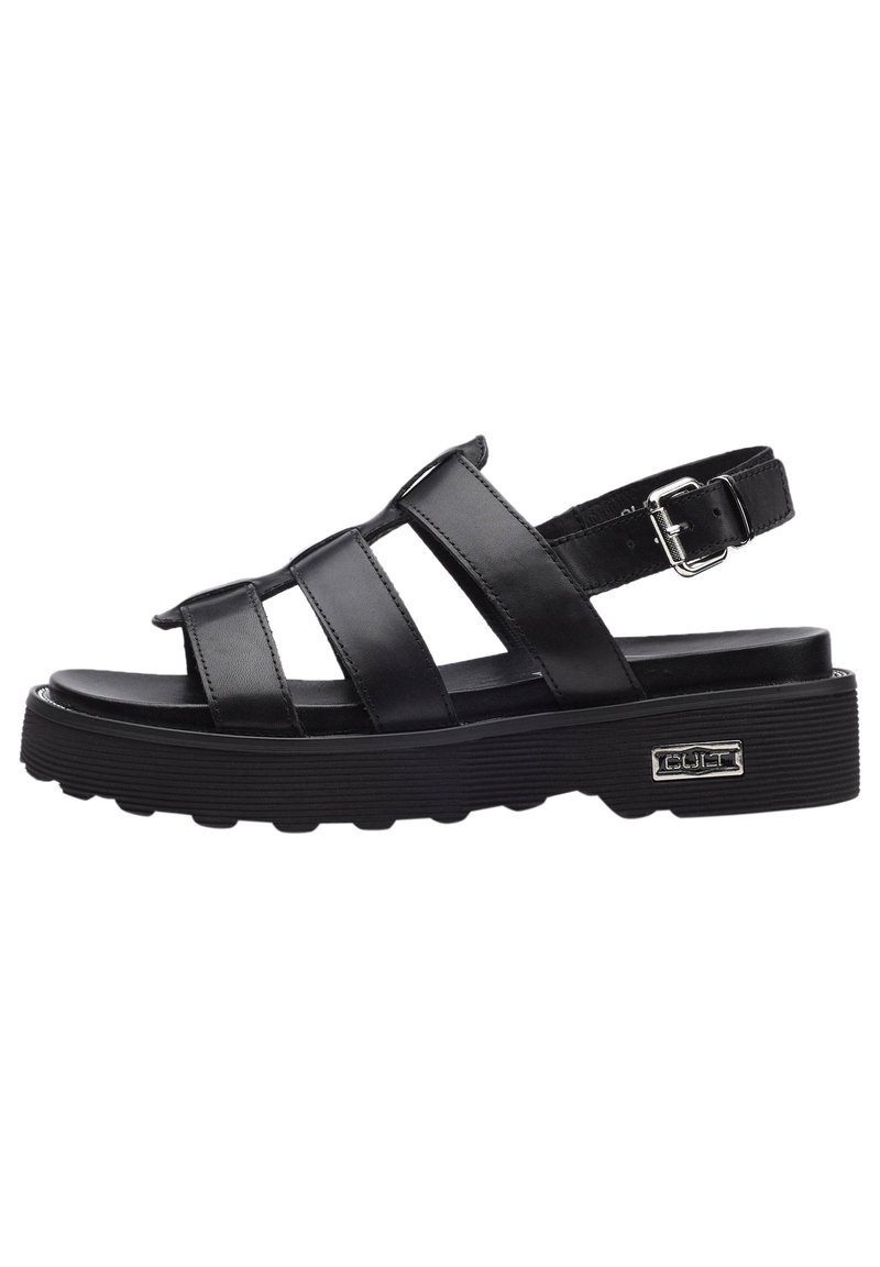 Sandali neri in pelle con tre fasce larghe, fibbia regolabile alla caviglia, suola spessa e testurizzata, e logo in metallo sul lato.