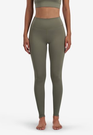 Olive green high-waisted leggings made from stretchy fabric, fitted silhouette, smooth texture, and no visible patterns or logos.