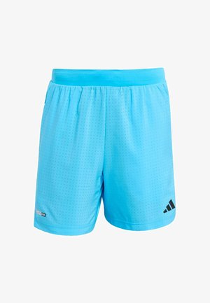 Jasnoniebieskie, perforowane spodenki sportowe z elastycznym pasem, z małym czarnym logo u dołu po prawej stronie oraz etykietą Climacool u dołu po lewej stronie.