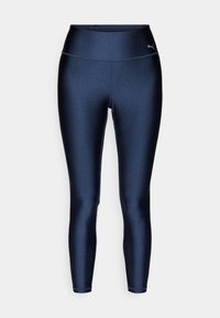 Granatowe legginsy sportowe wykonane z błyszczącego, elastycznego materiału. Wysoki stan, bez widocznych wzorów lub elementów metalowych. Dopasowane nogawki do kostek.