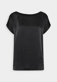 Blouse en satin noire à manches courtes, col rond large et coupe ample sur un fond uni.