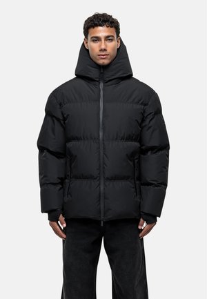 Black puffer jacket with a high collar and zip closure, featuring a quilted design, matte texture, and side pockets.