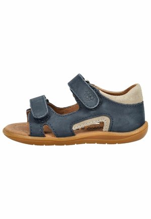 Børns mørkeblå sandal med to justerbare velcroremme, beige hælstøtte og brun gummisål, vist i sideprofil.