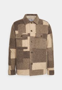 Brun og beige ternet uldjakke med krave, knaplukning foran og to brystlommer med knapklap.