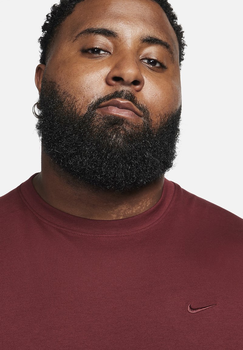 Nike Performance PRIMARY - Sport T-Shirt - dark team red dark team red