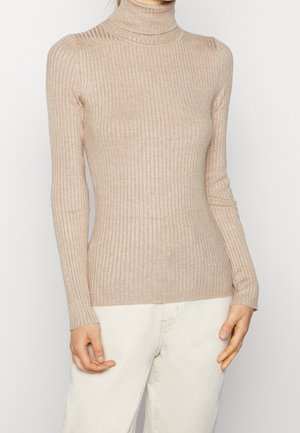 Stickad tröja - sand