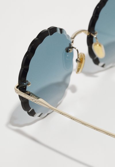 CHLOÉ ROSIE RIMLESS ROUNDED METAL SUNGLASSES - Óculos de sol - gold-coloured/blue