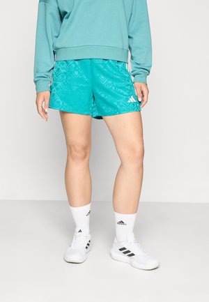 TIRO  - Sports shorts - pure teal/white