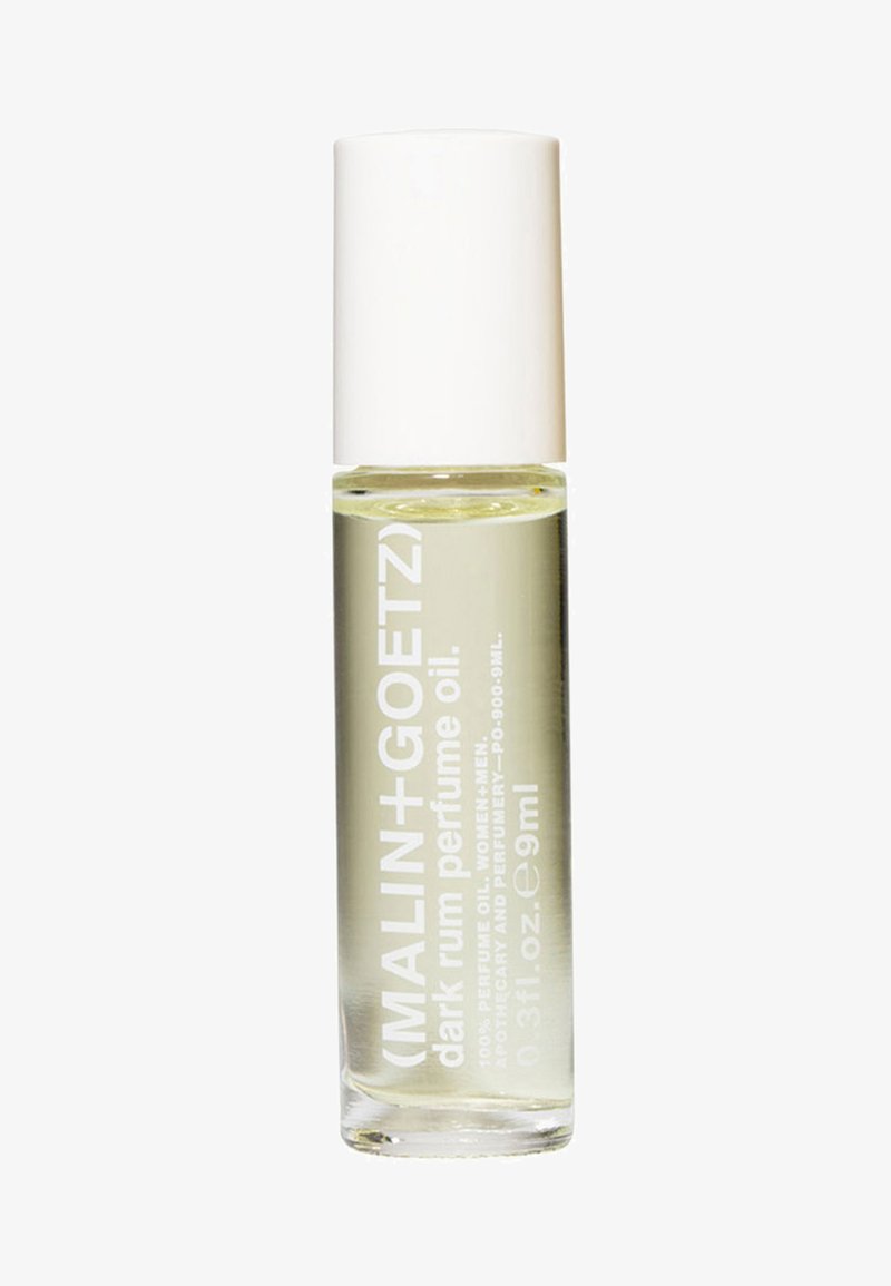 Roll-on-Parfümöl in einer klaren Glasflasche mit einem weißen Deckel. Das Etikett zeigt fett gedruckten weißen Text auf einem transparenten Hintergrund.