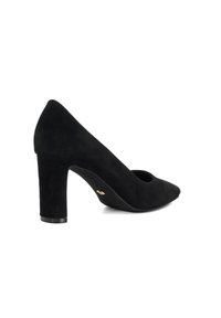 Black suede high-heeled pump with a pointed toe and a chunky heel. The shoe has a smooth texture and an open cut on the side.