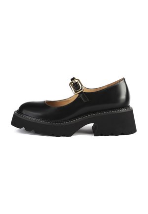 Czarne skórzane buty Mary Jane z okrągłym noskiem, regulowanym paskiem z klamrą oraz teksturowanym obcasem z platformą o ząbkowanej krawędzi.