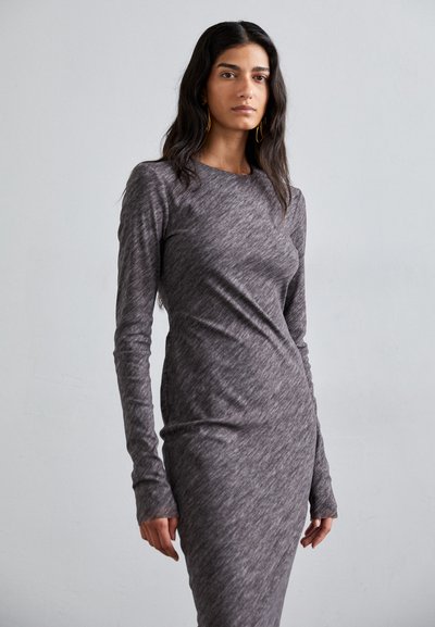 Long-sleeve, form-fitting dress in a heathered gray fabric, featuring a crew neckline and subtle ruching detail on one side.