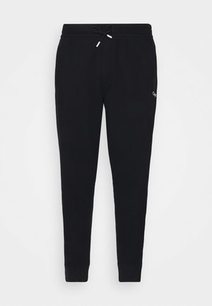 ESSENTIAL TAPE PANT - Teplákové kalhoty - black