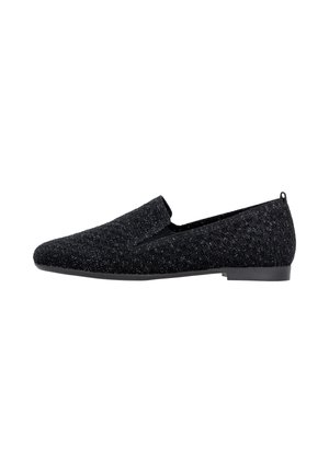 Chaussure noire tissée texturée à enfiler avec semelle plate et petite languette au talon, vue de côté sur fond blanc.