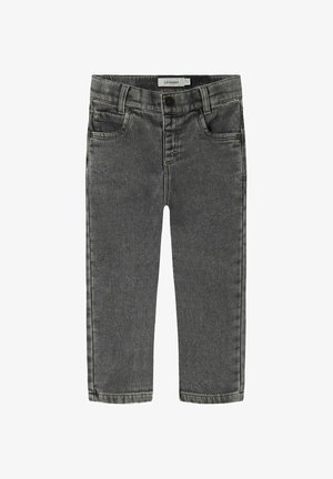 Hallid hallid teksad kitsas lõikega, millel on ees nuppude sulgemine, vöörihmade aasad ja viis taskut. Klassikaline 5-tasku disain ja sirged sääred.