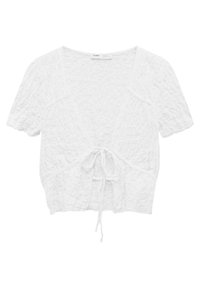 Blouse blanche courte avec un tissu texturé, manches courtes, un décolleté en V profond et un cordon de serrage à l'avant pour la fermeture.