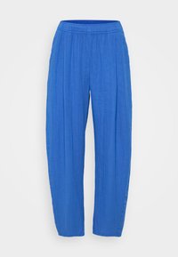 Blå, lätta, texturerade byxor med elastisk midja och en lös, vid design. Perfekta för avslappnad användning eller komfort.