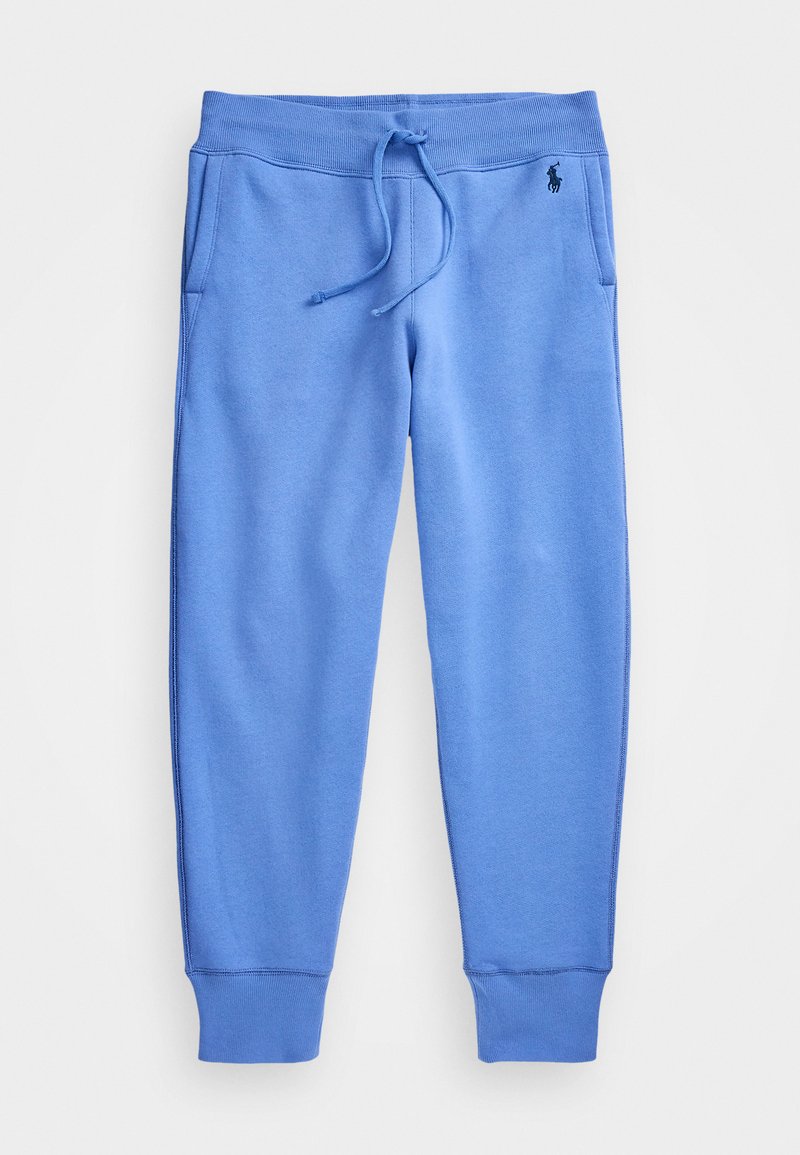 Zili treniņbikses, izgatavotas no kokvilnas maisījuma auduma, ar elastīgu jostasvietu un saistītiem aukliņām, ribinātām aprocēm un nelielu logo akcentu.