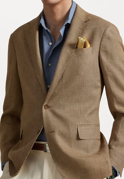 Bruine textuur blazer met een ruitpatroon, enkele knoopsluiting, notch-revers en een zakdoek in een geel en blauw paisleymotief.