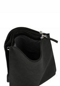 Borsa in pelle nera con un design curvato, dotata di più scomparti con zip e una superficie liscia. L'interno è foderato in tessuto nero.