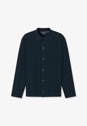 Marineblaue Bluse mit klassischem Kragen, strukturierter Stoff, einer einzigen Brusttasche und sechs runden Knöpfen vorne.