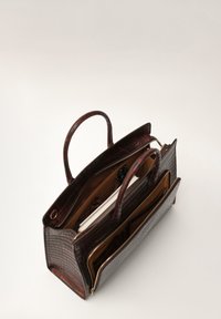 Brown crocodile-patterned leather bag with two handles, multiple compartments, and a zippered closure. Interior includes pockets and a document holder.