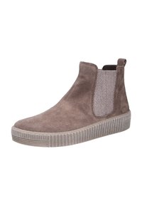 Bottines Chelsea en suédine taupe avec des panneaux latéraux élastiques et une semelle en caoutchouc texturée. Caractéristiques : bout rond et tirette à l'arrière.