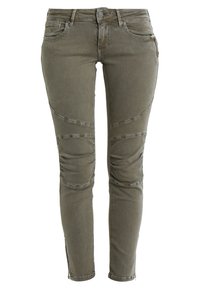 Olivově zelené skinny džíny z denimu, s jemně zpevněnými panely pod koleny a zipy na kotnících pro přiléhavý vzhled.