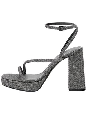 Sandales à plateforme grises pailletées avec un talon bloc, une fine bride à la cheville et un design avant en forme de V. Finition texturée avec une semelle lisse.