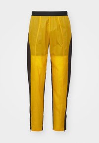 TROUSERS - Træningsbukser - yellow/ brown