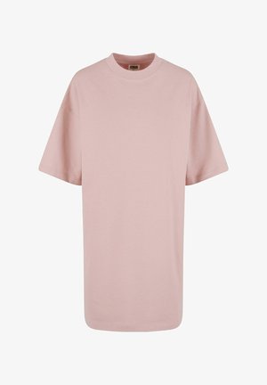 Roza oversize majica iz mehkega bombažnega materiala. Oblikovanje vključuje okroglo ovratnika in kratke rokave s pravim robom.