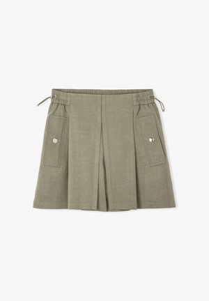 Khaki linnen rok met een elastische tailleband, twee zijzakken en een geplooid design. Bevat metalen accenten op de zakflappen.