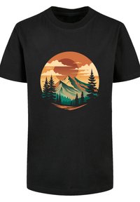 Black cotton t-shirt featuring a circular graphic of mountains, pine trees, and an orange sunset, with layered colors and detailed textures.
