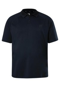 Polo bleu marine en tissu texturé, doté d'un col classique, d'une patte de boutonnage à deux boutons et d'un logo discret sur la poitrine.