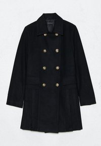 Manteau en laine noir de type pea coat avec un design à double boutonnage, boutons dorés, deux poches avant et un dos plissé. Tissu texturé.