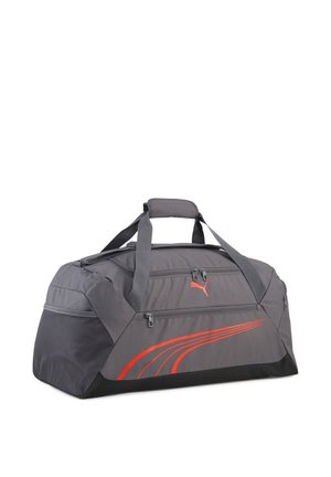 Gray and black Puma duffel bag with side mesh pocket, dual top handles, front zippers, and red logo and stripe design on white background.