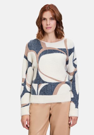 Fleece sweater in cream, blue, and brown patterns; features a relaxed fit, round neckline, and soft, textured fabric.
